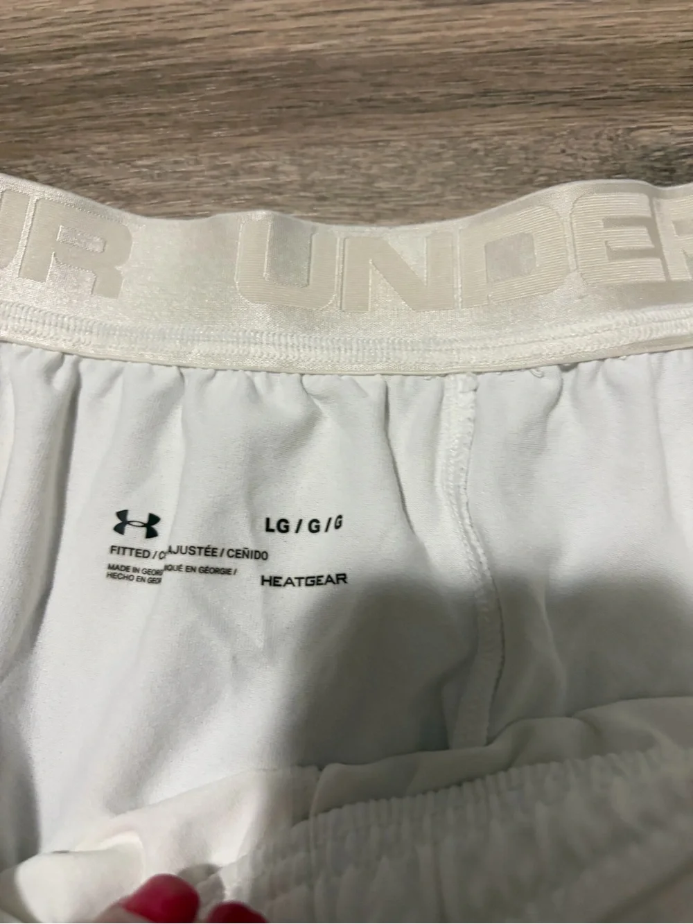 Under Armour White Men’s Athletic soccer Shorts with Red Logo Accents